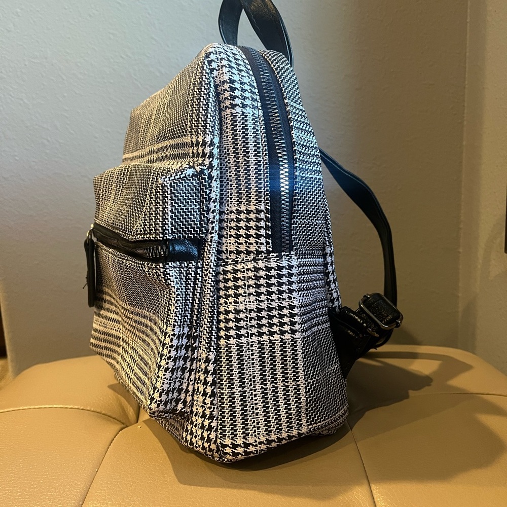 Like New Stylish Black and White Backpack